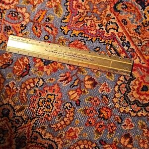 Gold ruler advertising for California auto transport